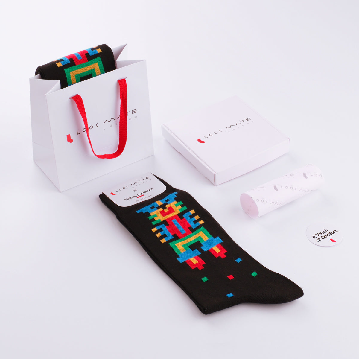 space-themed designer socks with bold pixel graphics and cosmic details